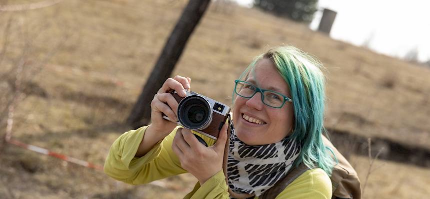 Mensch mit Fotokamera